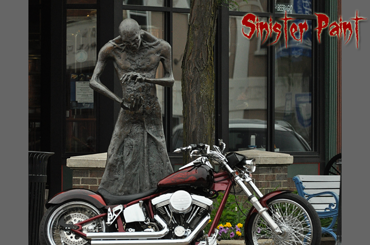 Custom painted motorcycle by Sinister Paint of Hastings, Michigan.